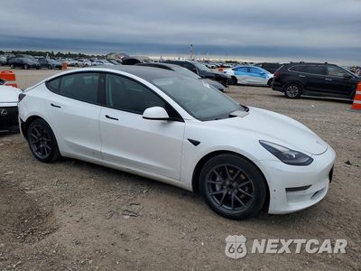 Czwarte zdjęcie samochodu z boku: 2021 TESLA MODEL 3 VIN:5YJ3E1EA6MF026762 - miniatura