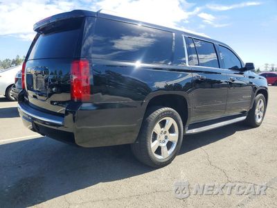Trzecie zdjęcie samochodu z tyłu: 2016 CHEVROLET SUBURBAN C1500 LTZ VIN:1GNSCJKC0GR460916 - miniatura