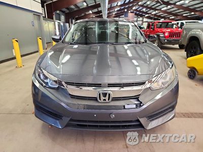 Piąte zdjęcie samochodu w środku: 2017 HONDA CIVIC LX VIN:19XFC2F58HE035338 - miniatura