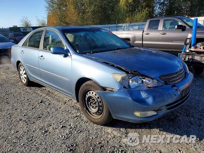 Czwarte zdjęcie samochodu z boku: 2003 TOYOTA CAMRY XLE VIN:JTDBE30K030176869 - miniatura
