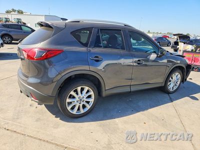 Trzecie zdjęcie samochodu z tyłu: 2014 MAZDA CX-5 GT VIN:JM3KE4DY1E0342508 - miniatura