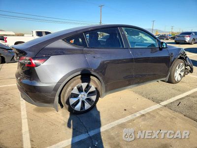 Trzecie zdjęcie samochodu z tyłu: 2024 TESLA MODEL Y VIN:7SAYGDEE8RF037311 - miniatura