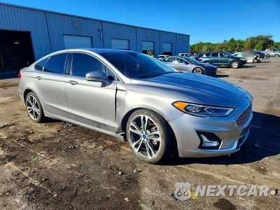 Czwarte zdjęcie samochodu z boku: 2020 FORD FUSION TITANIUM VIN:3FA6P0D91LR131138 - miniatura
