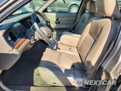 Zdjęcie 7 z 12 samochodu: 2004 FORD CROWN VICTORIA LX VIN:2FAFP74W64X115681 - miniatura