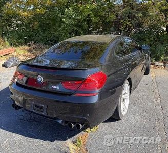 Czwarte zdjęcie samochodu z boku: 2014 BMW M6 VIN:WBSLX9C57ED160535 - miniatura