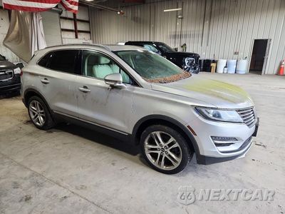 Czwarte zdjęcie samochodu z boku: 2015 LINCOLN MKC VIN:5LMTJ2AH8FUJ44786 - miniatura