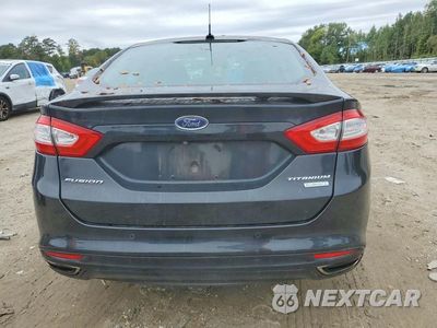 Zdjęcie 6 z 12 samochodu: 2014 FORD FUSION TITANIUM VIN:3FA6P0K98ER258278 - miniatura