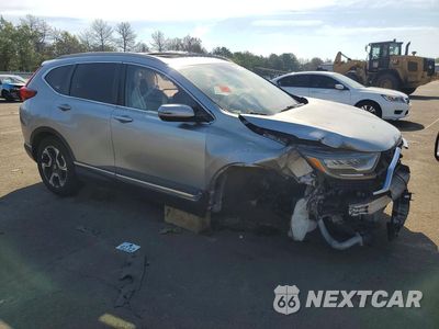 Czwarte zdjęcie samochodu z boku: 2017 HONDA CR-V TOURING VIN:2HKRW2H95HH633788 - miniatura