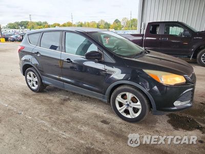 Czwarte zdjęcie samochodu z boku: 2014 FORD ESCAPE SE VIN:1FMCU0GX2EUD18461 - miniatura