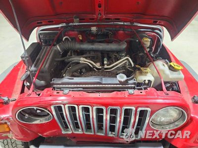 Zdjęcie 12 z 13 samochodu: 2005 JEEP WRANGLER X VIN:1J4FA39S45P358434 - miniatura