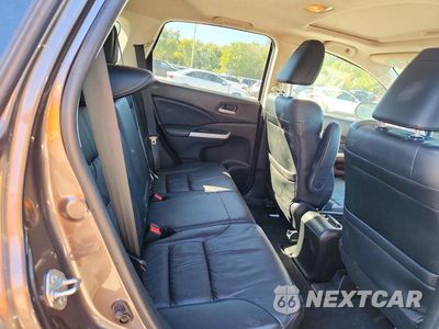 Zdjęcie 11 z 14 samochodu: 2014 HONDA CR-V EXL VIN:2HKRM4H72EH690168 - miniatura
