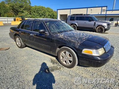 Czwarte zdjęcie samochodu z boku: 2011 FORD CROWN VICTORIA LX VIN:2FABP7EV3BX153726 - miniatura