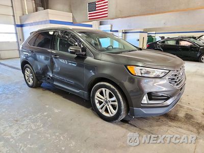 Czwarte zdjęcie samochodu z boku: 2019 FORD EDGE SEL VIN:2FMPK4J94KBC64171 - miniatura
