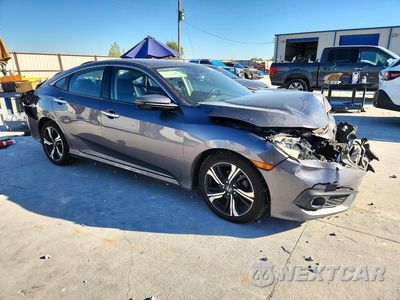 Czwarte zdjęcie samochodu z boku: 2017 HONDA CIVIC TOURING VIN:19XFC1F92HE021965 - miniatura