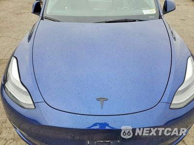 Zdjęcie 11 z 12 samochodu: 2023 TESLA MODEL Y VIN:7SAYGDEE8PF802997 - miniatura