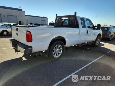 Trzecie zdjęcie samochodu z tyłu: 2014 FORD F250 SUPER DUTY VIN:1FT7X2AT9EEA53823 - miniatura