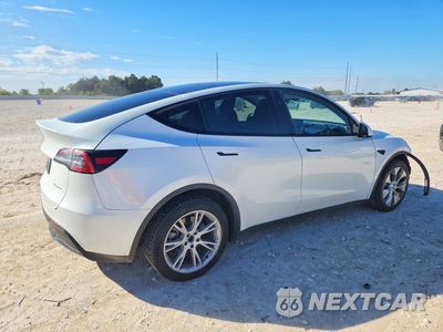 Trzecie zdjęcie samochodu z tyłu: 2023 TESLA MODEL Y VIN:7SAYGDEE3PA149167 - miniatura