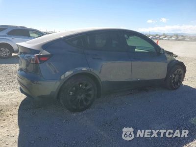 Trzecie zdjęcie samochodu z tyłu: 2023 TESLA MODEL Y VIN:7SAYGDEE3PF761484 - miniatura