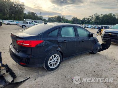 Trzecie zdjęcie samochodu z tyłu: 2018 FORD FOCUS SE VIN:1FADP3FE5JL209046 - miniatura