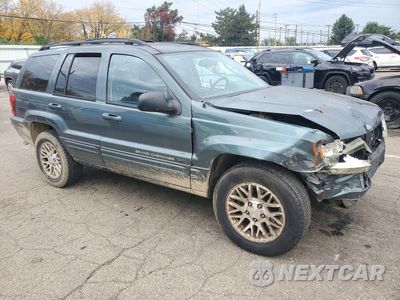Czwarte zdjęcie samochodu z boku: 2004 JEEP GRAND CHEROKEE LIMITED VIN:1J4GW58S74C152193 - miniatura