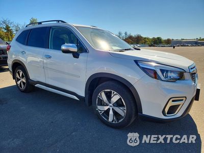 Czwarte zdjęcie samochodu z boku: 2019 SUBARU FORESTER TOURING VIN:JF2SKAWC9KH459558 - miniatura