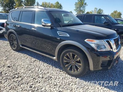 Czwarte zdjęcie samochodu z boku: 2017 NISSAN ARMADA PLATINUM VIN:JN8AY2NC6H9511011 - miniatura