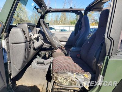 Zdjęcie 7 z 13 samochodu: 1999 JEEP WRANGLER / TJ SPORT VIN:1J4FY19S1XP460132 - miniatura
