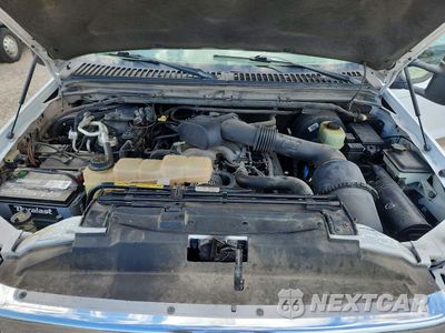Zdjęcie 12 z 13 samochodu: 2000 FORD EXCURSION LIMITED VIN:1FMNU43S4YEA30059 - miniatura