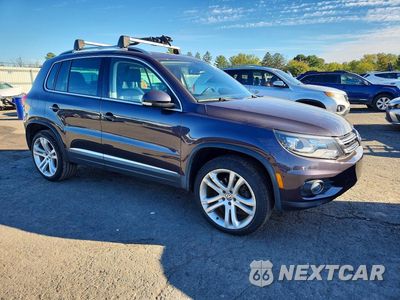 Czwarte zdjęcie samochodu z boku: 2016 VOLKSWAGEN TIGUAN S VIN:WVGAV7AX0GW546603 - miniatura