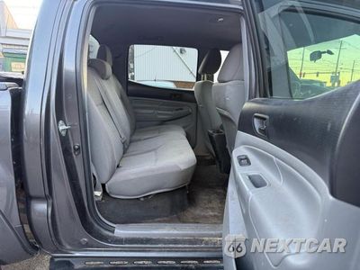 Zdjęcie 6 z 14 samochodu: 2015 TOYOTA TACOMA V6 VIN:3TMLU4EN3FM199466 - miniatura