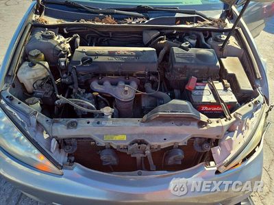 Zdjęcie 11 z 12 samochodu: 2005 TOYOTA CAMRY LE VIN:4T1BE32K75U984267 - miniatura