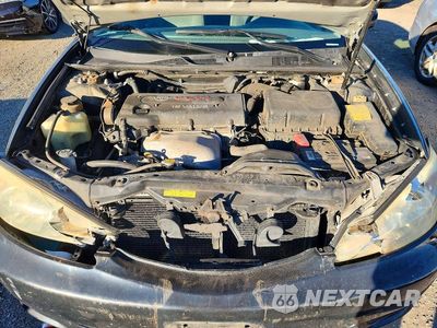 Zdjęcie 11 z 12 samochodu: 2003 TOYOTA CAMRY LE VIN:JTDBE32K430238996 - miniatura