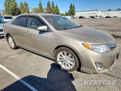 Czwarte zdjęcie samochodu z boku: 2014 TOYOTA CAMRY HYBRID XLE VIN:4T1BD1FK4EU140317 - miniatura