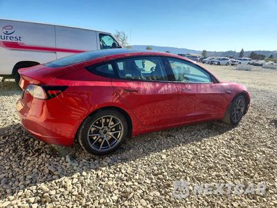 Trzecie zdjęcie samochodu z tyłu: 2022 TESLA MODEL 3 VIN:5YJ3E1EA0NF288908 - miniatura