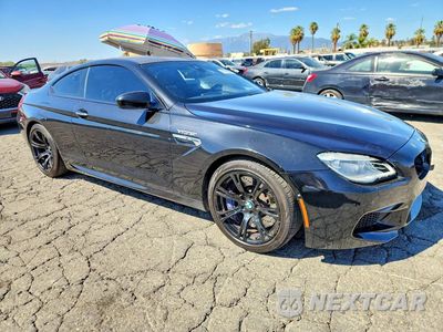 Czwarte zdjęcie samochodu z boku: 2016 BMW M6 VIN:WBS6J9C59GD934561 - miniatura