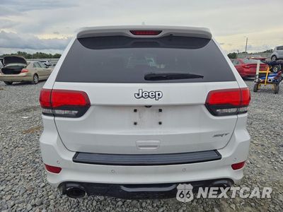 Zdjęcie 6 z 14 samochodu: 2014 JEEP GRAND CHEROKEE SRT-8 VIN:1C4RJFDJ9EC459754 - miniatura