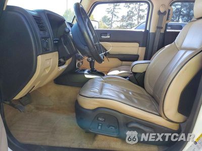 Zdjęcie 7 z 13 samochodu: 2007 HUMMER H3 VIN:5GTDN13E778224693 - miniatura