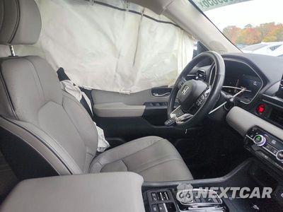 Zdjęcie 7 z 13 samochodu: 2024 HONDA PILOT ELITE VIN:5FNYG1H83RB014522 - miniatura