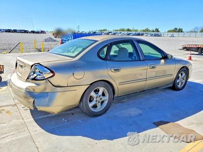 Trzecie zdjęcie samochodu z tyłu: 2001 FORD TAURUS SES VIN:1FAFP55UX1G216922 - miniatura