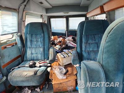 Zdjęcie 10 z 13 samochodu: 1992 CHEVROLET SUBURBAN VIN:2GBEG25KXN4121687 - miniatura