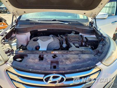 Zdjęcie 12 z 13 samochodu: 2014 HYUNDAI SANTA FE SPORT 2.0T VIN:5XYZW3LA0EG213978 - miniatura