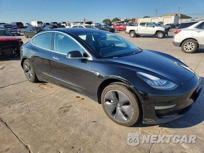 Czwarte zdjęcie samochodu z boku: 2019 TESLA MODEL 3 VIN:5YJ3E1EB2KF385483 - miniatura