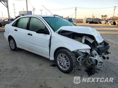 Czwarte zdjęcie samochodu z boku: 2006 FORD FOCUS ZX4 VIN:1FAHP34N06W130619 - miniatura