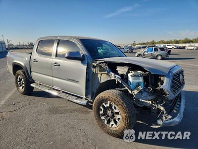 Czwarte zdjęcie samochodu z boku: 2020 TOYOTA TACOMA TRD OFF-ROAD VIN:3TMCZ5AN3LM291296 - miniatura