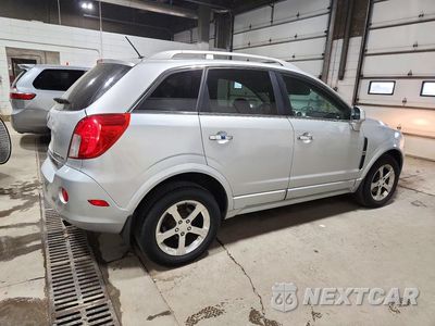 Trzecie zdjęcie samochodu z tyłu: 2013 CHEVROLET CAPTIVA LT VIN:3GNFL3EK2DS526567 - miniatura