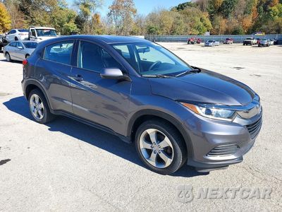 Czwarte zdjęcie samochodu z boku: 2019 HONDA HR-V LX VIN:3CZRU6H35KG704104 - miniatura