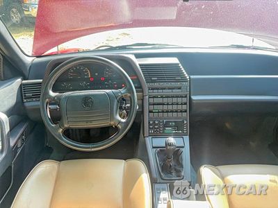 Zdjęcie 9 z 10 samochodu: 1991 ALFA ROMEO 164 SPORT VIN:ZAREA33E1M6216041 - miniatura