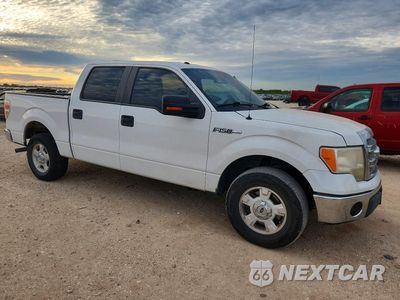 Czwarte zdjęcie samochodu z boku: 2014 FORD F150 SUPERCREW VIN:1FTFW1CF9EKE92814 - miniatura