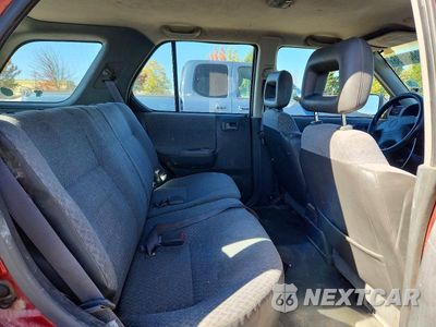 Zdjęcie 11 z 13 samochodu: 1999 HONDA PASSPORT EX VIN:4S6CM58W7X4426314 - miniatura