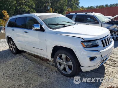 Czwarte zdjęcie samochodu z boku: 2014 JEEP GRAND CHEROKEE OVERLAND VIN:1C4RJFCTXEC192093 - miniatura